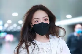 邓家佳现身上海，身穿白色蕾丝露脐装性感迷人，一举一动千娇百媚图片