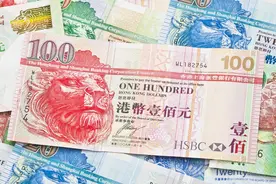 香港金管局前总裁：应该将人民币国际化推向新台阶，香港采用双币结算图片