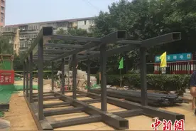 北京今年200多部“加装”外挂电梯将运行 拟推广“爬楼器”图片