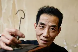 沈龙胜：提笼架鸟图片