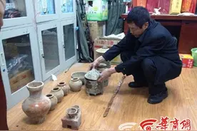 后院挖水窖挖出古墓 铜川两男子私自盗取13件文物被刑拘图片