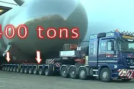 世界上最大卡车，载重400吨，62个轮子图片