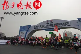 苏州太湖国际马拉松开跑 徐州小伙夺得男子全程马拉松冠军图片