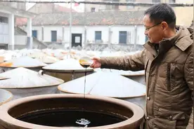 腊八年味之罗埠百年土酱油图片