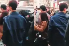 男友力max！东方神起昌珉单手护住女同事避让车辆图片