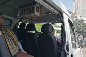 天太热 这个驾驶员竟在车内装了个家用空调图片
