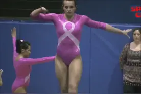 一位体操妹妹精彩的平衡木表演图片