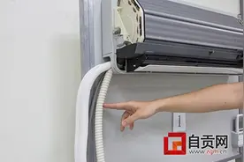 空调使用高峰期 水滴雨棚扰邻图片