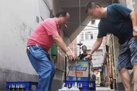 告别“水塔之家”　30多年蜗居生活成历史图片