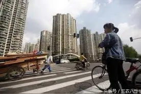 农民工进城买房，不愿意转为城市户口为哪般？图片
