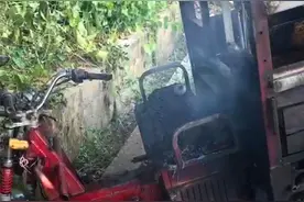 开着车，突然屁股下很烫还冒烟！桂林这司机屁股差点着火图片
