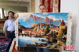 甘肃临夏手工艺人传承近千年编织技艺 挂毯宛若油画图片