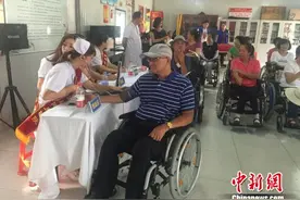 唐山大地震42周年：唐山人为截瘫患者的幸福接力图片