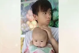 28岁高颜值爸爸抱着6月大女儿，网友：爸爸好帅气，妈妈好福气图片