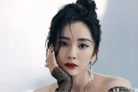 杨幂开始尝试赫本风，无奈却被“网纱”抢镜，网友称赞说很性感图片