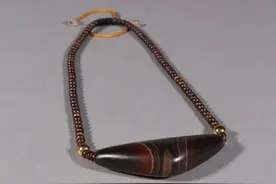 藏传 缠丝玛瑙牛角珠。规格x宽7.2x2.7cm 重53.5g图片
