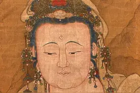一幅明代观音像，画中出现一只疑似穿越的鹦鹉，红色尖嘴让人害怕图片