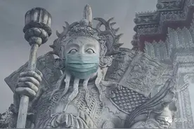 给泰国神像戴上防雾霾口罩拍写真？艺术师被警察抓了.......图片