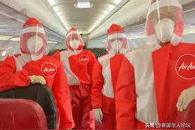 亚航空乘战疫新工作服亮相！图片