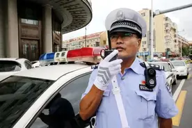【教育整顿进行时】道为田、腿为犁 33年钉在路上的“老黄牛” ——记交警道外大队大队长谢威图片