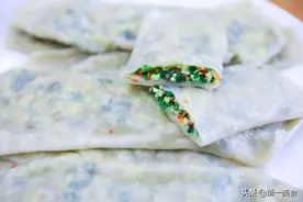 河南地道农家菜蟒，一卷一裹一蒸，皮薄馅多的菜蟒一会就出锅了图片