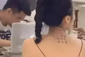 老婆出差后背上多了个纹身，朋友看了劝我分手，这是什么意思？哈图片