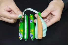 原来火腿肠金属环下面有个“小机关”，往下一拉完整打开，快试试视频封面