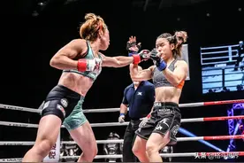中国女将张伟丽海外血洗日本女拳王，铁肘脸上划口子男人都怕图片