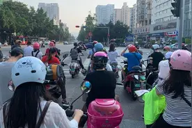 一小时448人骑电动车不戴头盔受罚 广西实施新规首日仍有市民“心大”图片