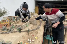 定兴父子拍摄“玩具战争片”走红网络图片