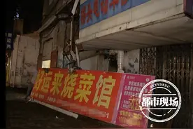 南昌：店铺招牌突掉落，居民担心存隐患图片