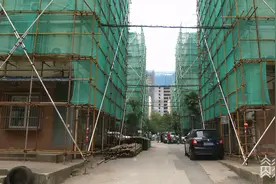 老旧小区改造工作复工 着力拆除违建、完善充电桩图片