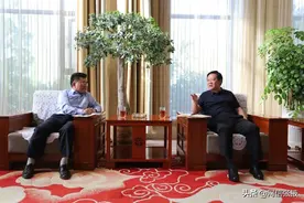 杨维俊与联合国开发计划署张卫东等座谈图片