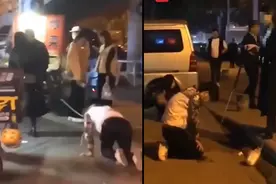 街头男子套绳被女子牵着跪行，民警查问【三分钟法治新闻全知道】图片
