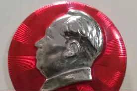 毛主席号召大办民兵师十周年纪念像章图片