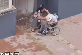 沈阳一女子当街殴打患病丈夫，扇耳光、用鞋子抽脸，邻居：她总打他，还见他哭两回图片