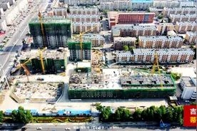 吉林市通潭大路一烂尾楼复工图片