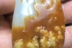 每日美玉：凤凰涅槃图片