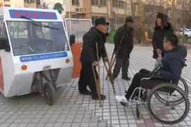 「视频」 鹤壁市残疾人发明“轮椅母子车”获国家专利图片