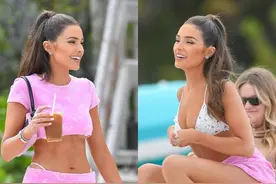OLIVIA CULPO穿着粉裙来海滨大秀好身材图片