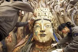 重庆工人维修800年前观音像，不小心触碰机关，却发现意外收获图片