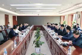 李永明会见山东高速集团党委书记、董事长周勇图片