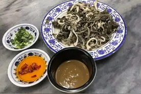 老北京的“爆肚”，以前穷人才吃，如今却成了“高端传统美食”图片
