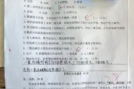 五年级语文期中考试，学生的成绩是97.5分，字迹如同印刷体图片