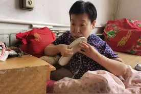 保定一重瘫女靠牙齿缝制绣花鞋：我想自食其力，不想被怜悯图片