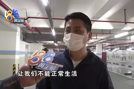 负二层车库做地坪漆，五楼业主胶带封门难抵气味图片