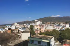 缝口罩的中老年缝纫机队——从村主任一次“史无前例”的喊话讲起图片