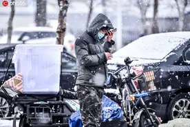 沈阳普降春雪图片
