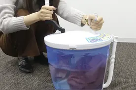 日本：朝日电器公司开发手动摇臂洗衣机图片