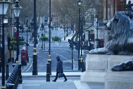 英国一周后或现日增病亡峰值图片